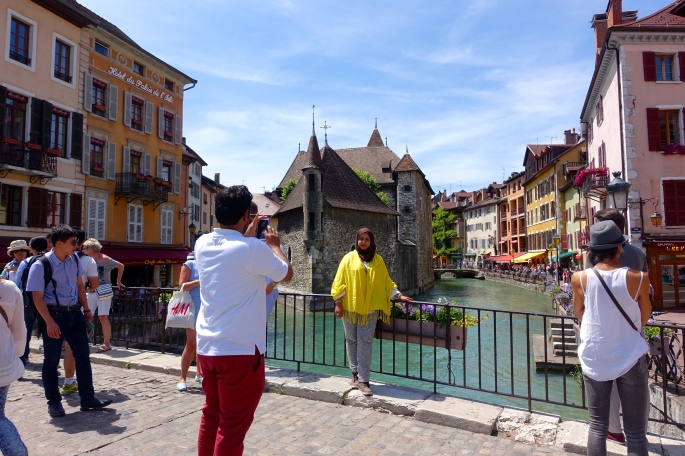 Couple on bridge in Annecy, France