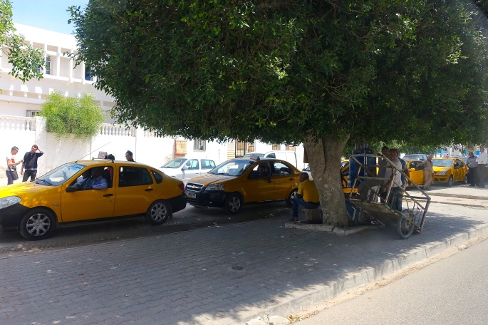 Taxi Stand. Men waiting in Tunisia